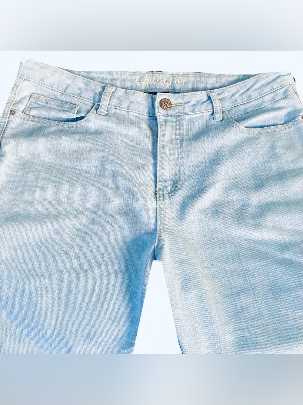 Liquid X Light Wash Flared Jeans